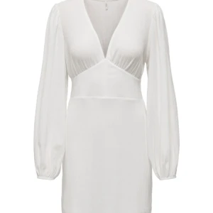 Vit klänning - Vit V-ringad klänning som bara används en gång så ser helt ny ut