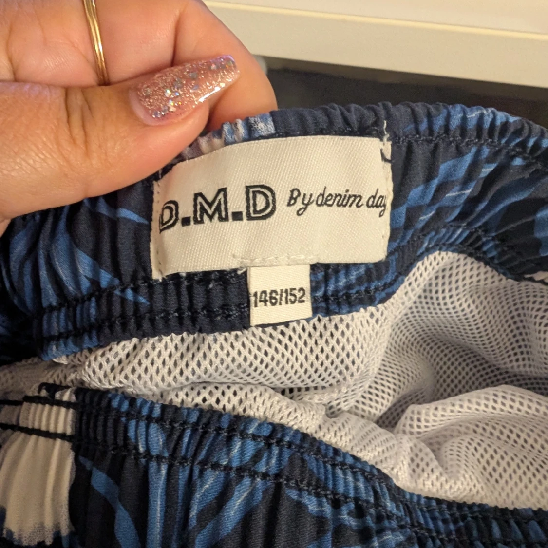 Blå blommiga badshorts från D.M.D stl 146-152 - 1