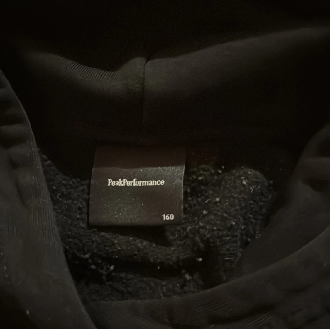 Svart hoodie från Peak Performance - 2