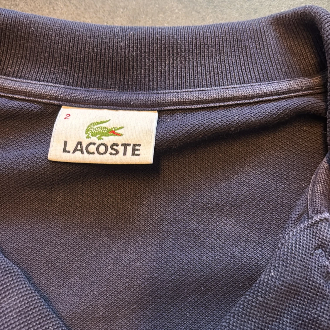 Marinblå pikétröja från Lacoste - 2