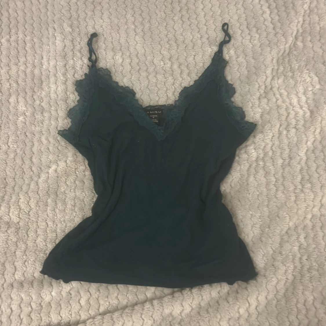 Mörkgrön linnetopp från Amisu