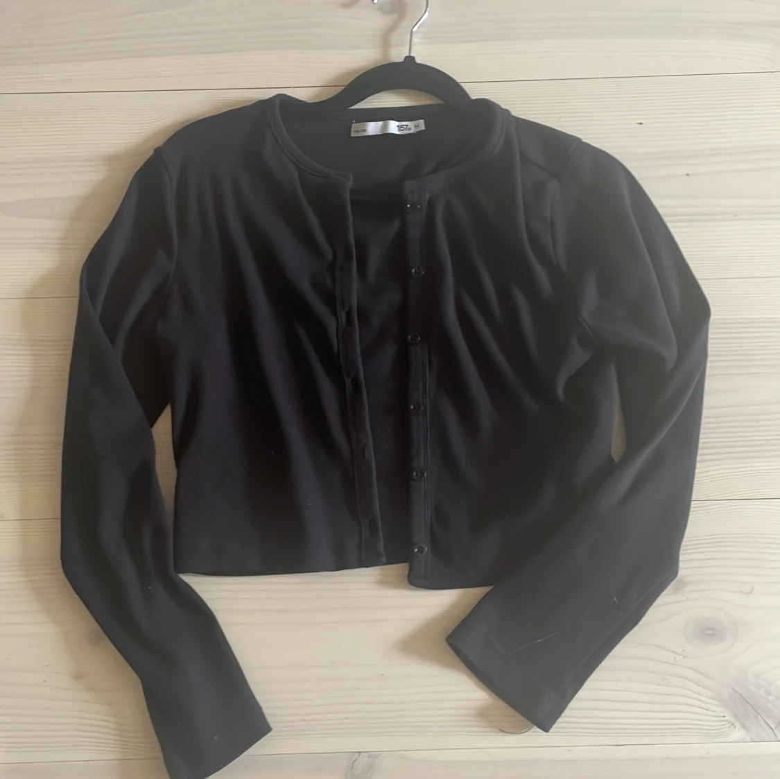 Svart kofta från 157, storlek M