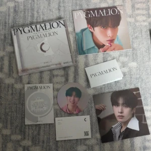 Pygmalion xion digipack - Oneus k-pop album kommer med allt + cd.