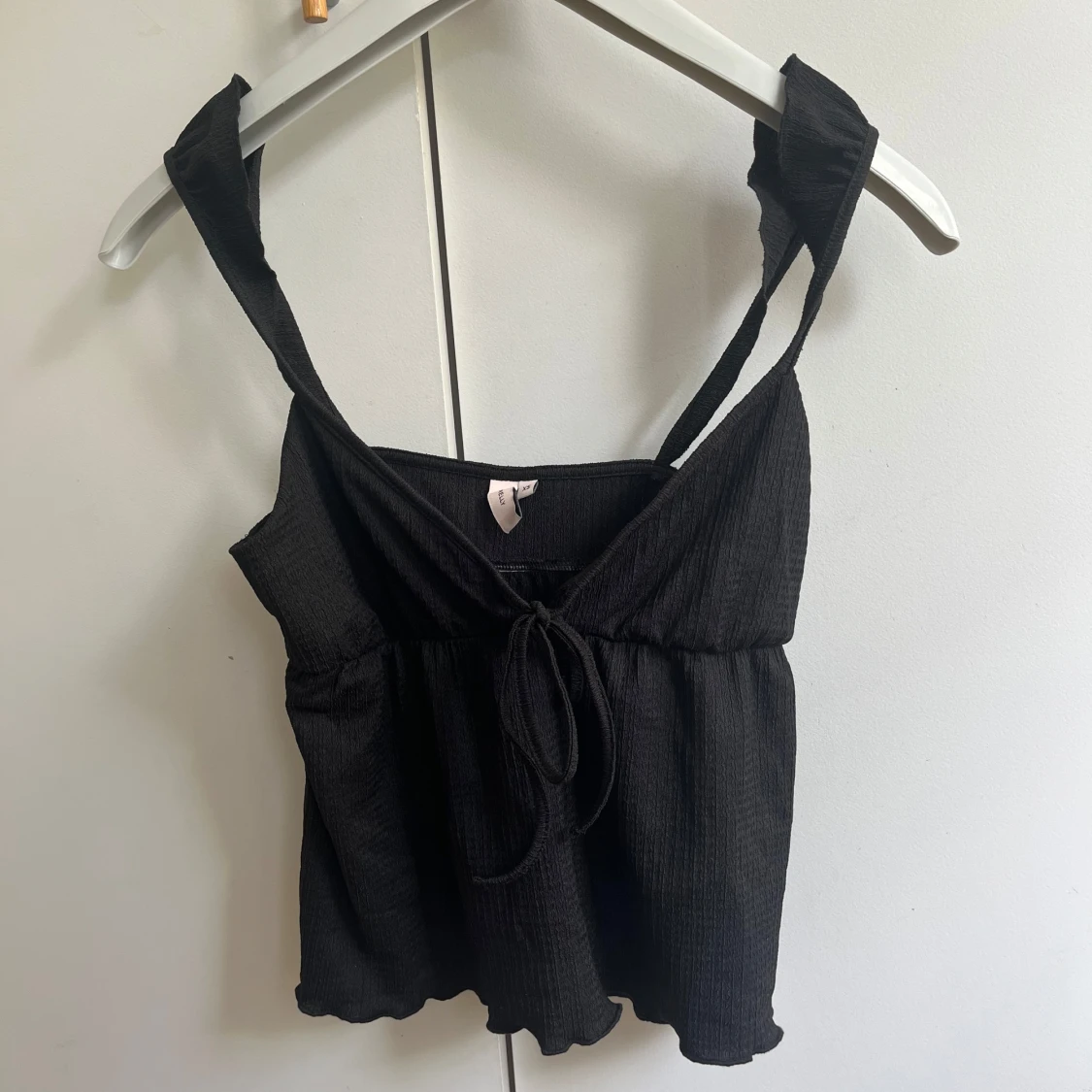 Svart linnetopp från Nelly XS