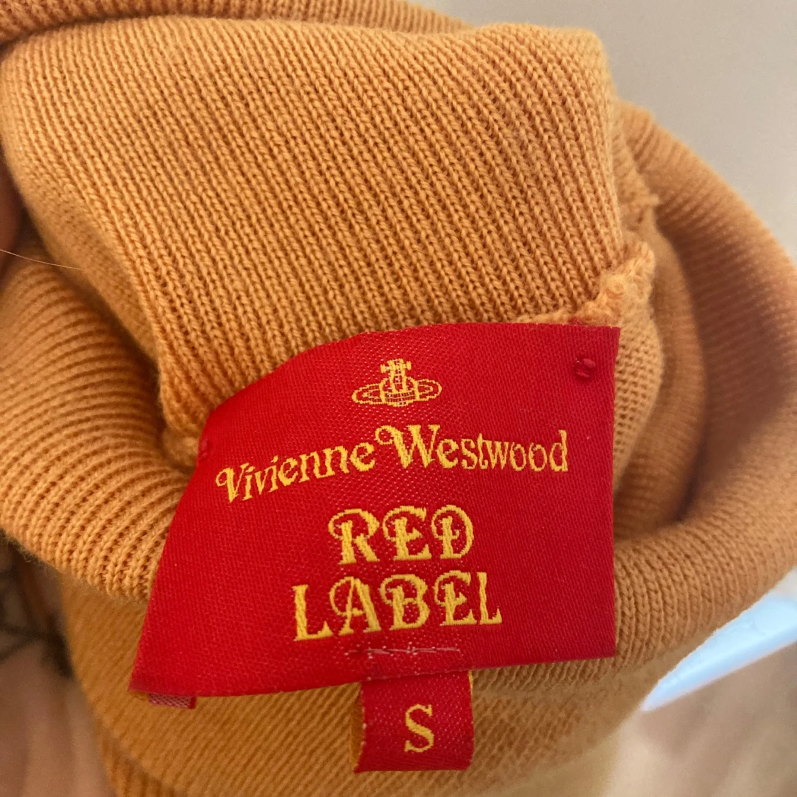 Orange ärmlös polotröja från Vivienne Westwood - 2