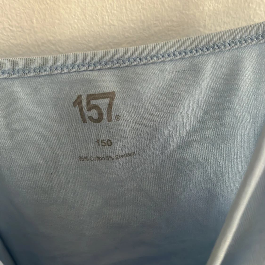 Ljusblå linnetopp från 157 - 1