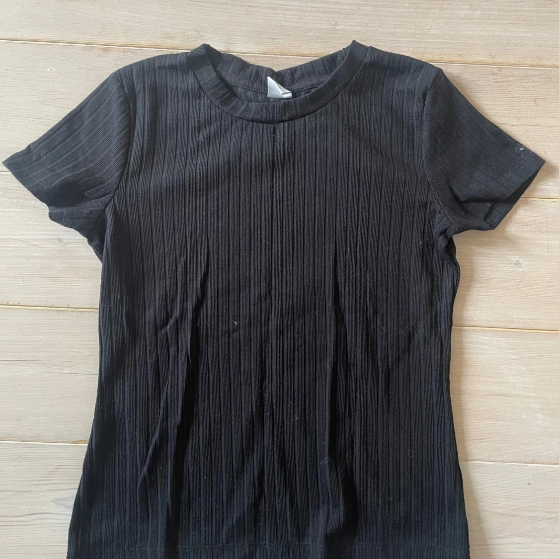 Svart ribbad topp från Lindex