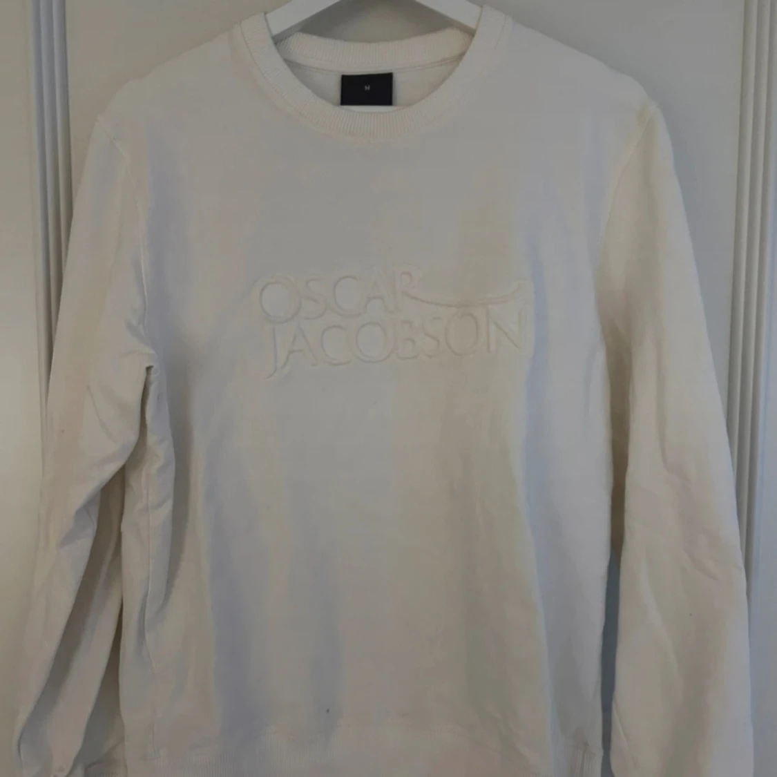 Vit sweatshirt från Oscar Jacobson