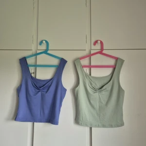 2 croppade linne-toppar från SHEIN, stl M - Säljer två croppade linne-toppar från SHEIN i storlek M. En blå och en grön💕 passar mig som har S och finns att köpa separat 💕