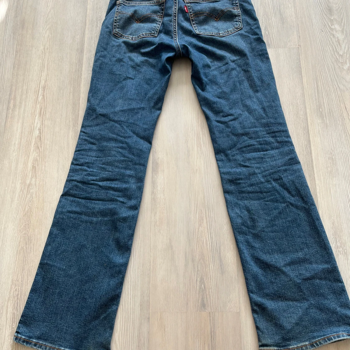 Superlow bootcut jeans blå, stl 25 - 1