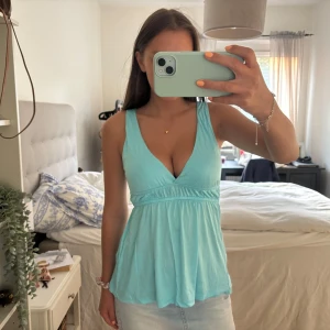 Topp - Så fin turkos topp!