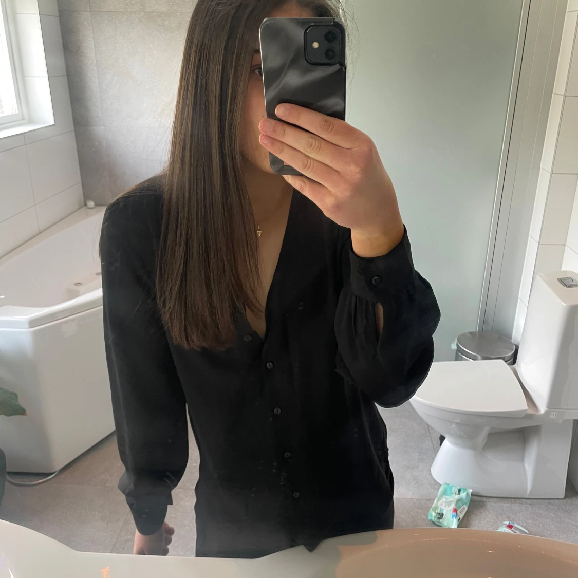 Svart blus köpt från Nelly