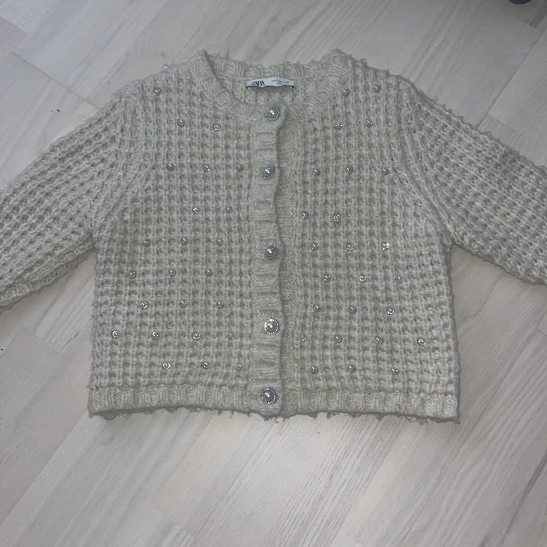 Beige stickad kofta från Zara