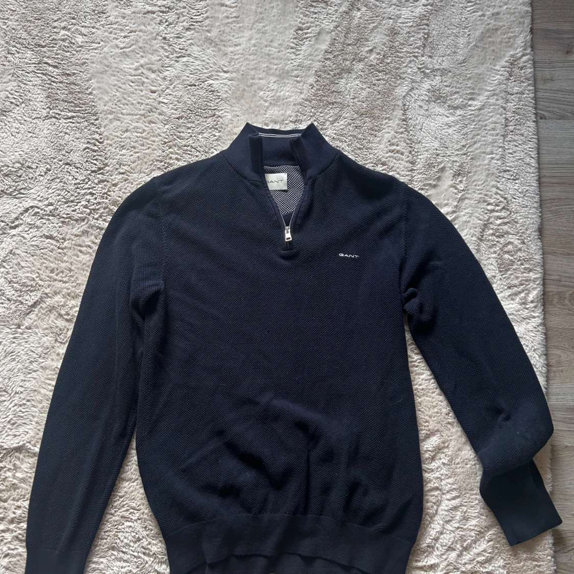 Mörkblå stickad tröja med dragkedja från GANT