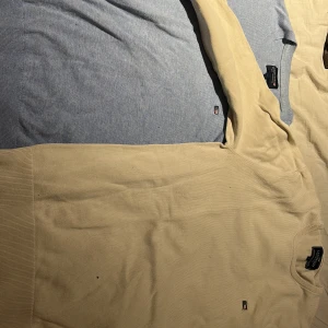 Beige och blå tröjor från lexington  - Lexington 