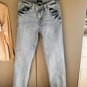 True religion jeans - Säljer ett par ljusblå jeans från true religion i modellen Ricky