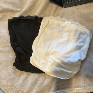 2 jätte fina tub toppar - En svart och en vit tub topp