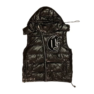 Corvidae Puffer Vest - Corvidae väst, strl M. Super bra skick ända är att ärmarna saknas, därav priset. Avtagbar luva