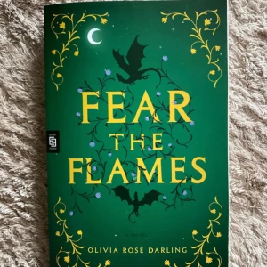 Fear the Flames - Helt ny, läst en gång. Utan skada. Häftad