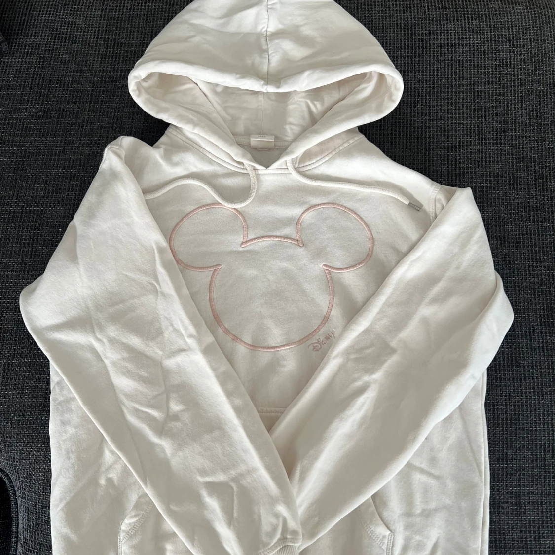 Krämvit hoodie med Disney tryck - 90