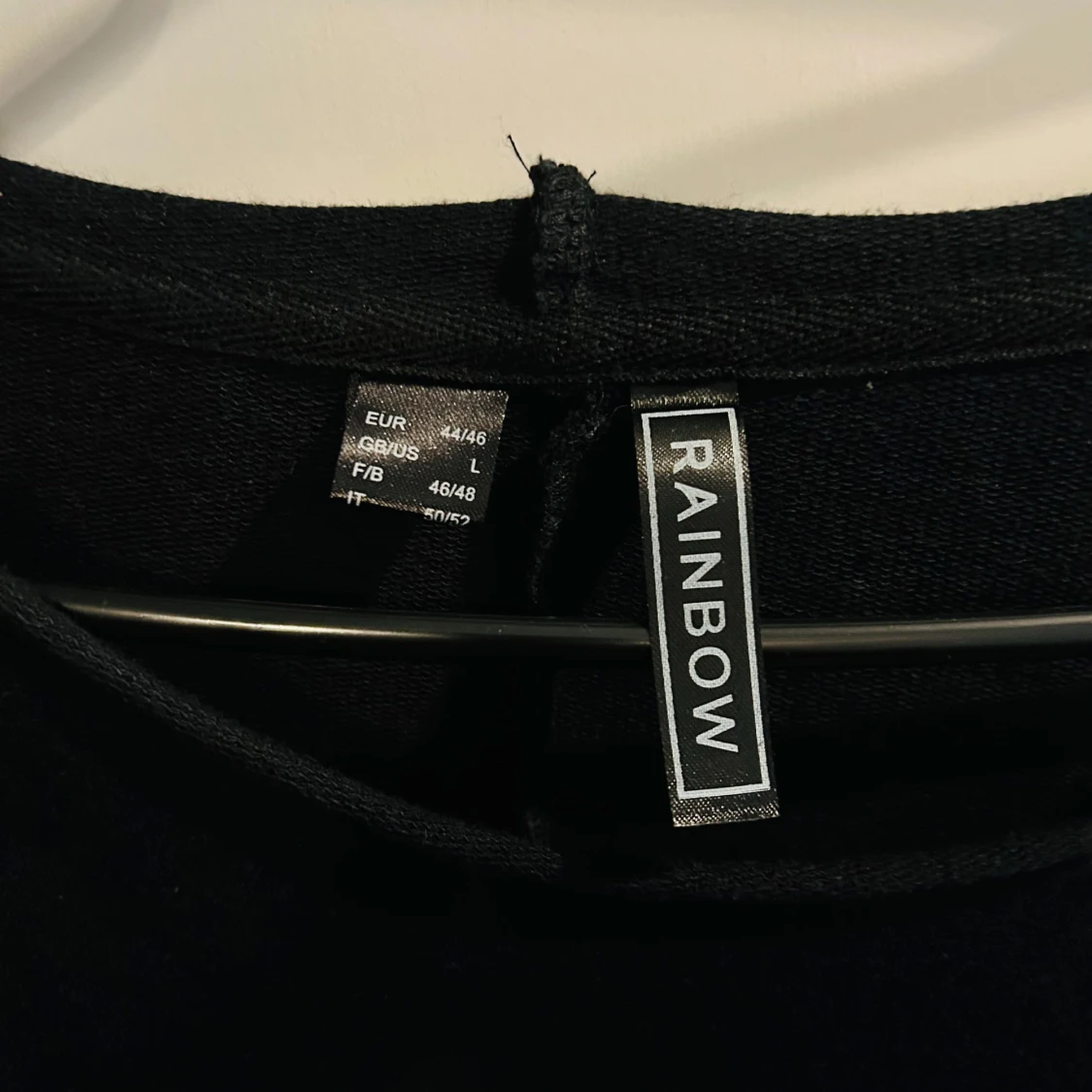 Svart klänning med silverdetaljer från Rainbow - 91