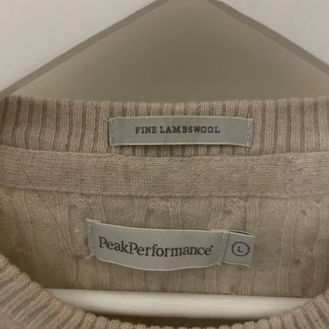 Beige stickad tröja från Peak Performance - 93