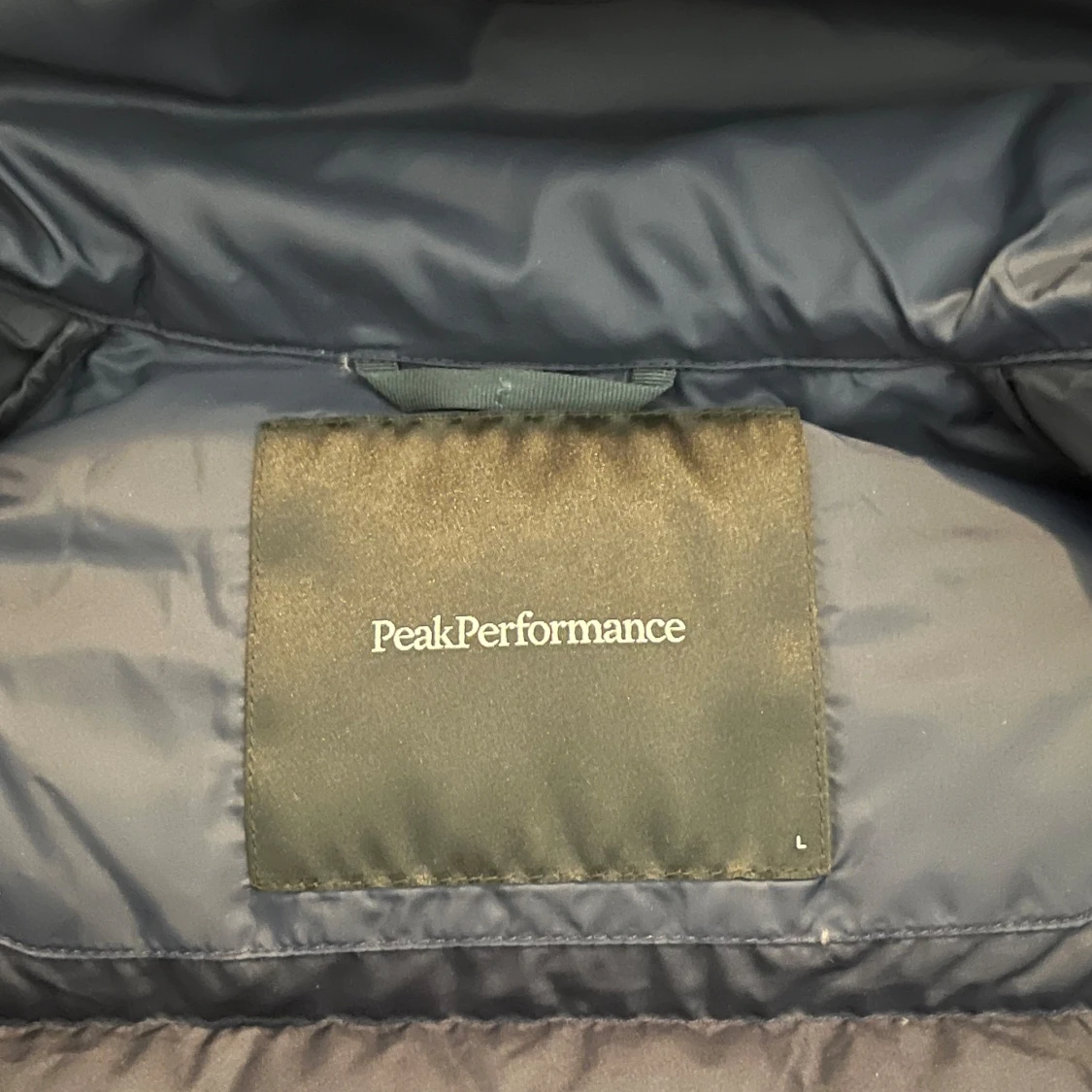 Mörkblå dunjacka från Peak Performance - 93