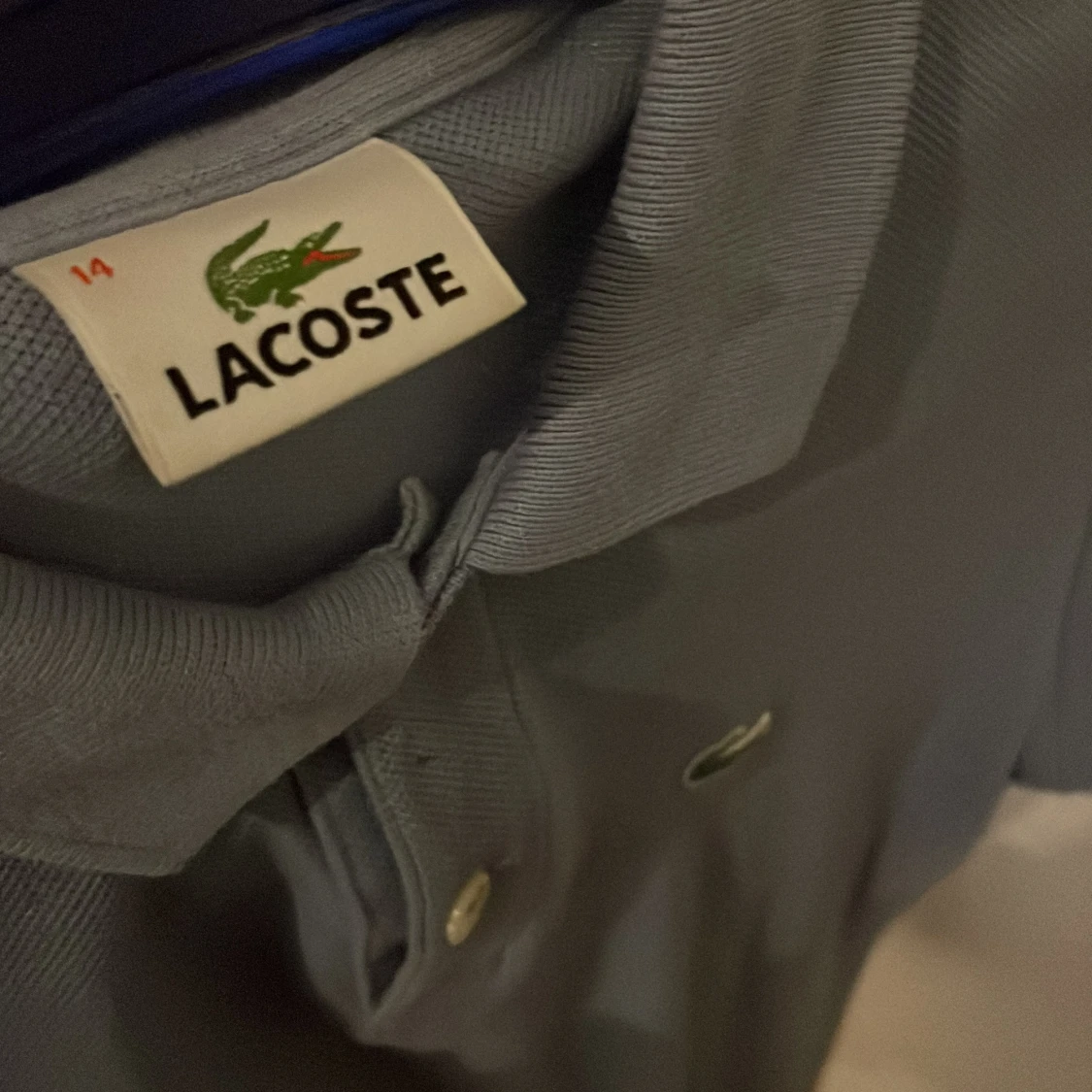 Ljusblå pikétröja från Lacoste - 2