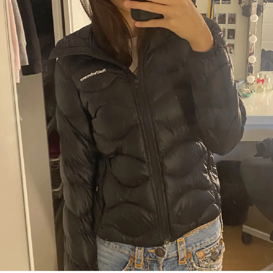 Svart dunjacka från Peak Performance