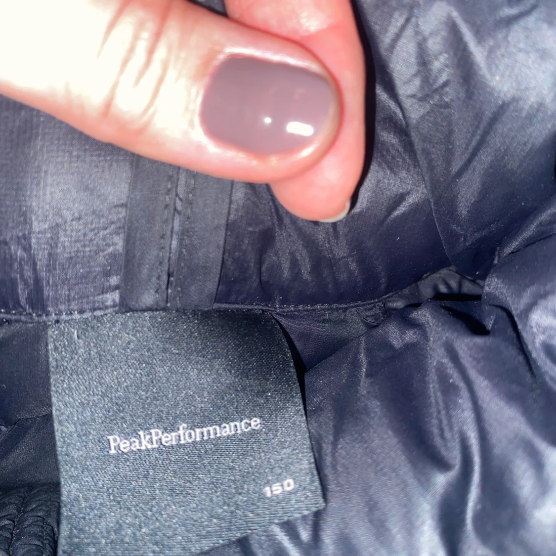 Svart dunjacka från Peak Performance - 91