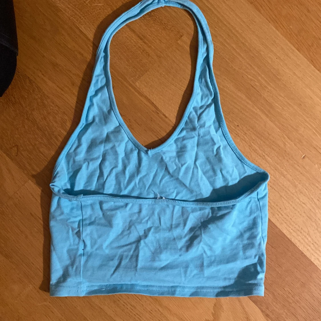 Turkos ärmlös linnetopp - 90