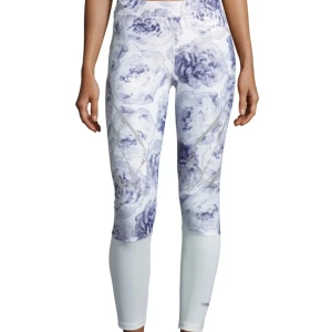 Träningstights  - Sällsynta träningstights från Stella McCartney x Adidas collab som bara legat i garderoben. Går inte längre att köpa! Vita och blå blommiga leggings, elastisk midja med dragsko. Inbyggda meshunderkläder. Storlek XS. Nypris 1300kr.
