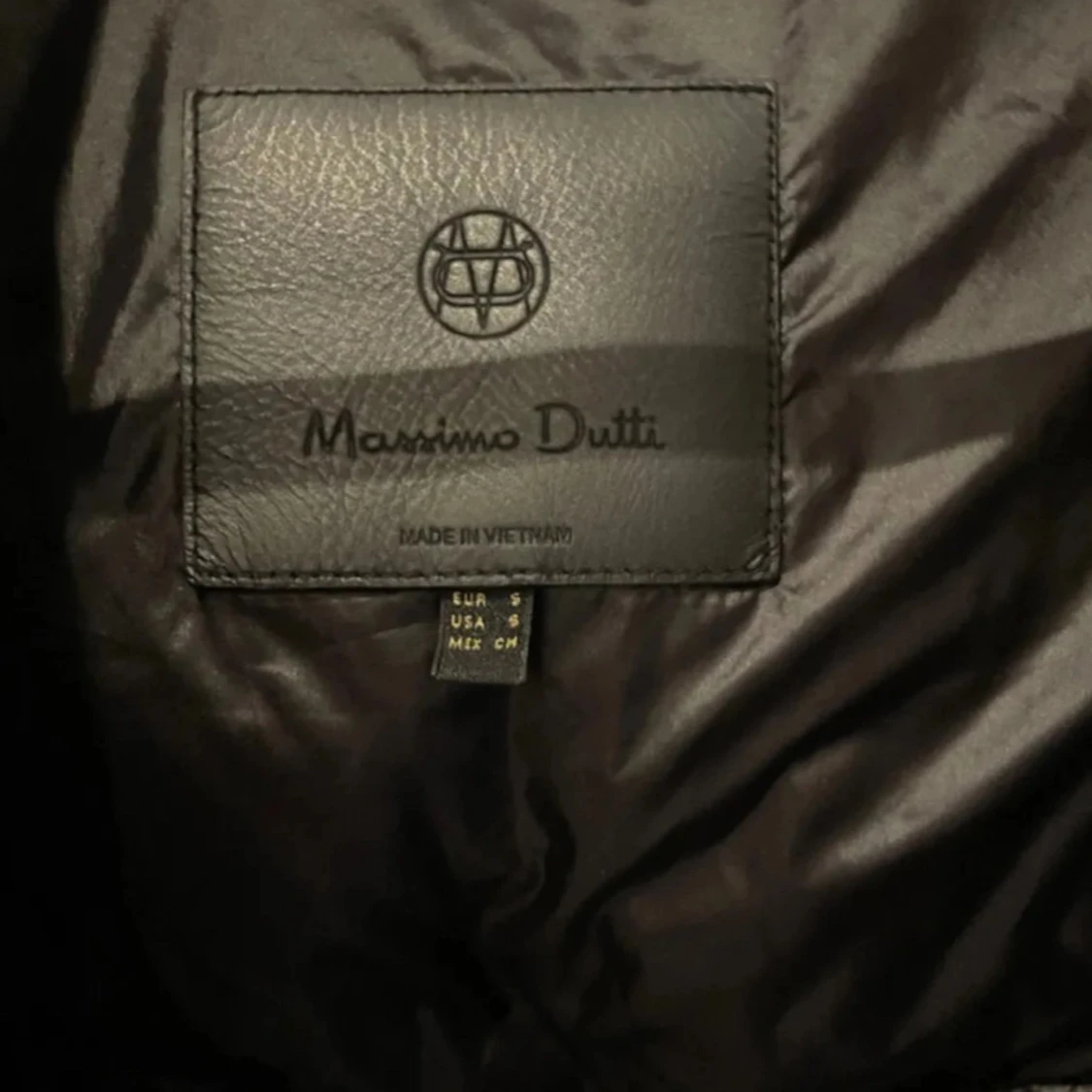 Grå pufferjacka från Massimo Dutti - 90