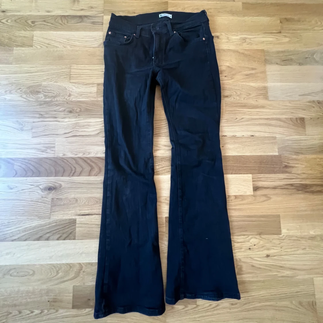 Svarta lågmidjade boot cut jeans - 91