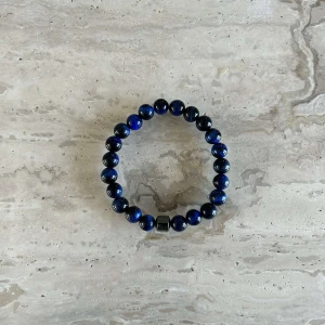 Tiger eye armband  - Färg: mörkblå  Helt ny 