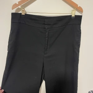 Kostymbyxor  - Kostymbyxor med hög midja från Lindex. Bra skick.