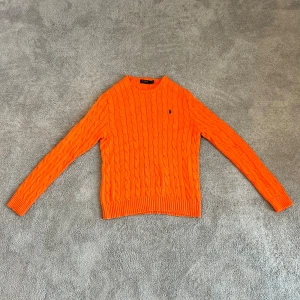 Ralph Lauren orange sweater  - No sign of damage.