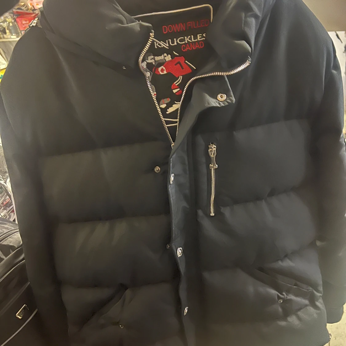 Svart dunjacka från Moose Knuckles