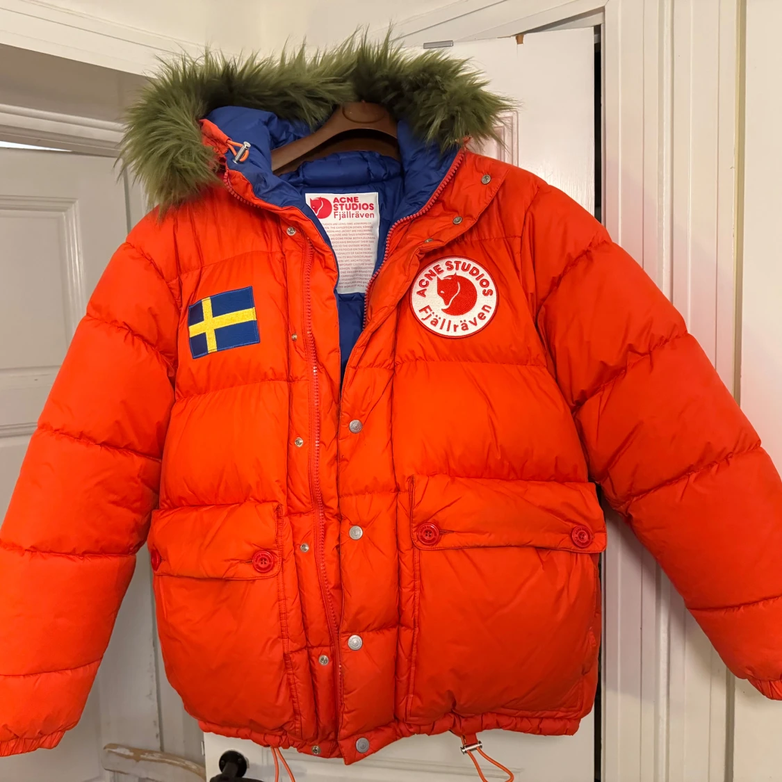 Orange dunjacka från Acne Studios