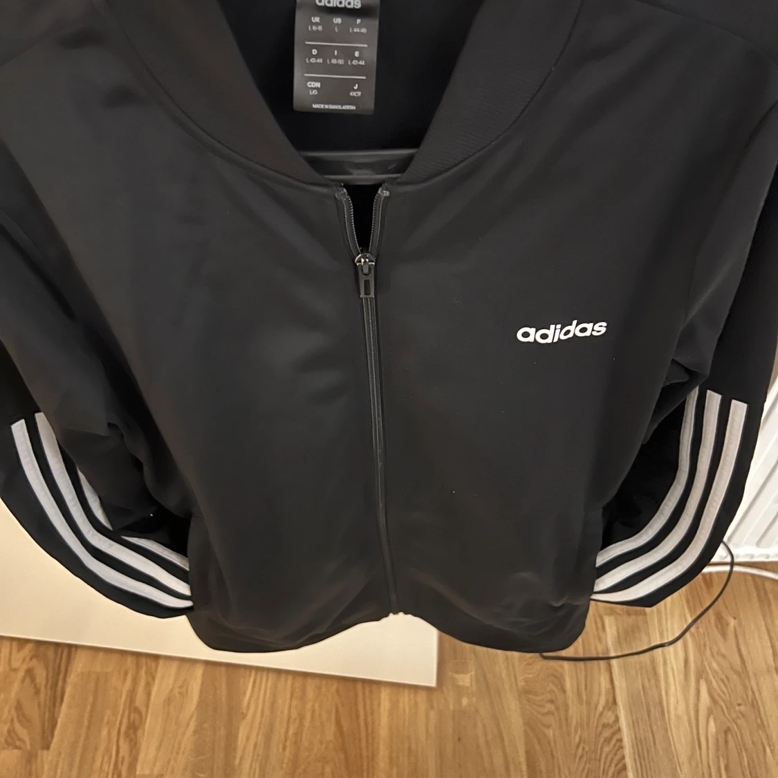 Svart träningsjacka från Adidas