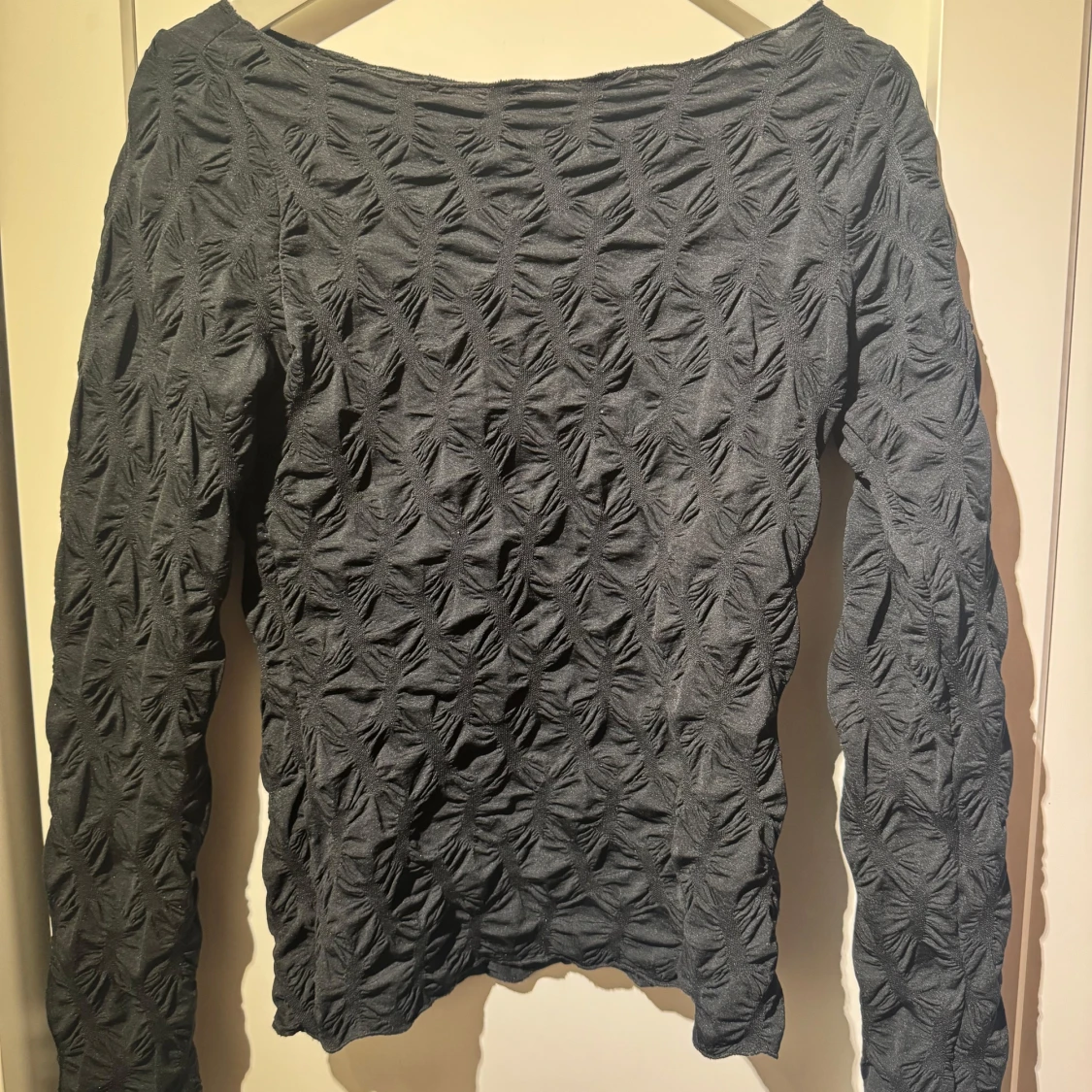 Svart långärmad topp från Gina Tricot