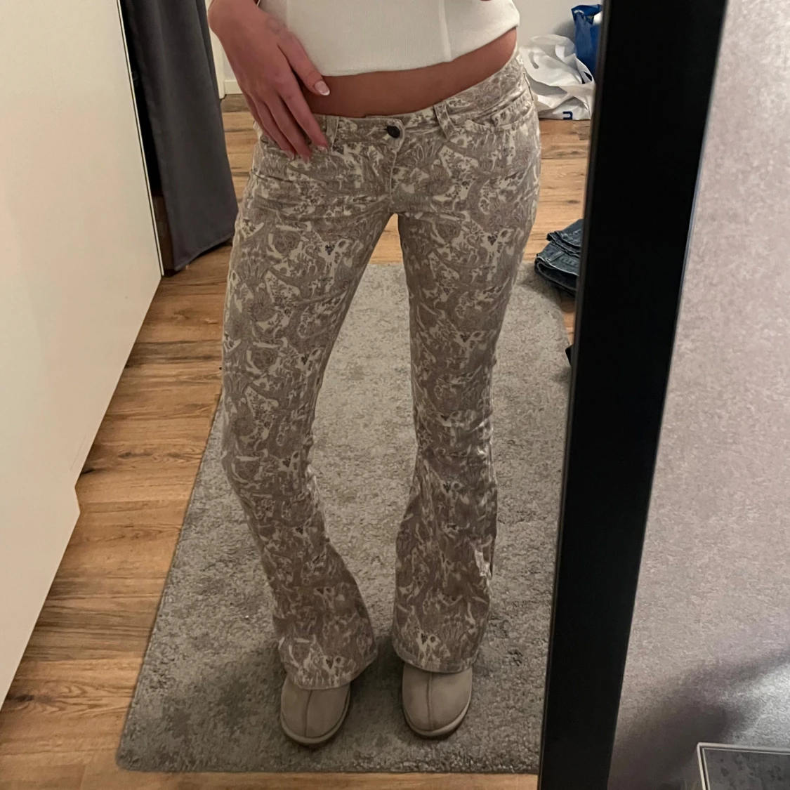 Mönstrade bootcut byxor - 90