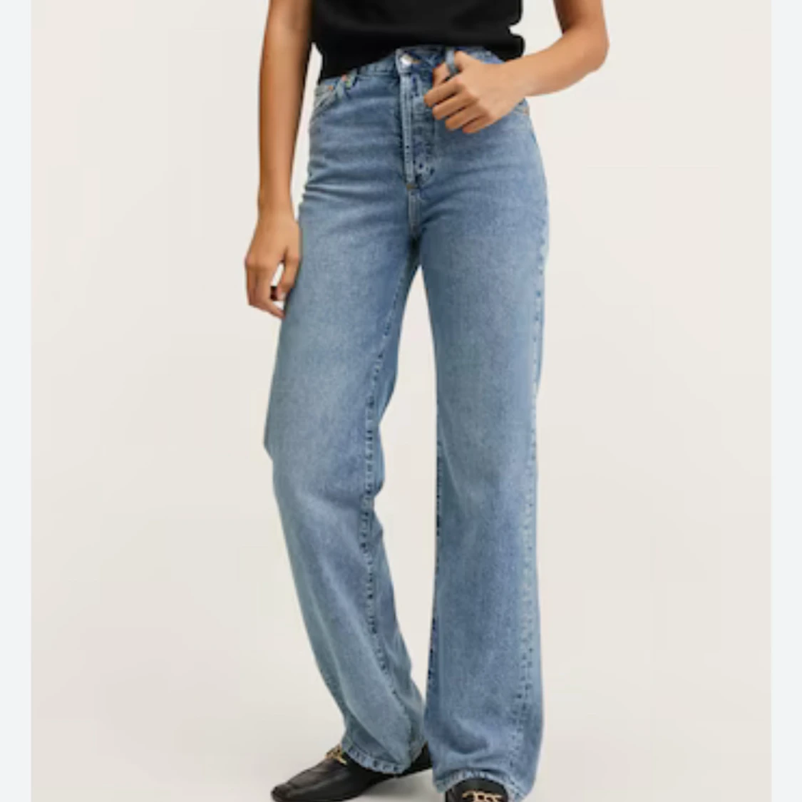 Blå högmidjade jeans