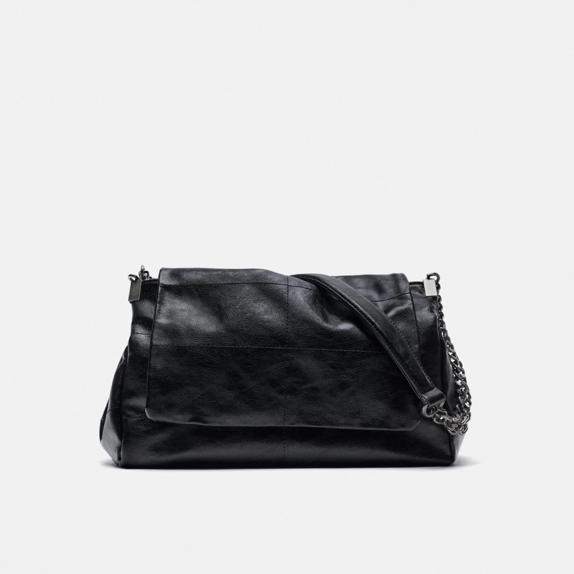 Axelväska med lock rock