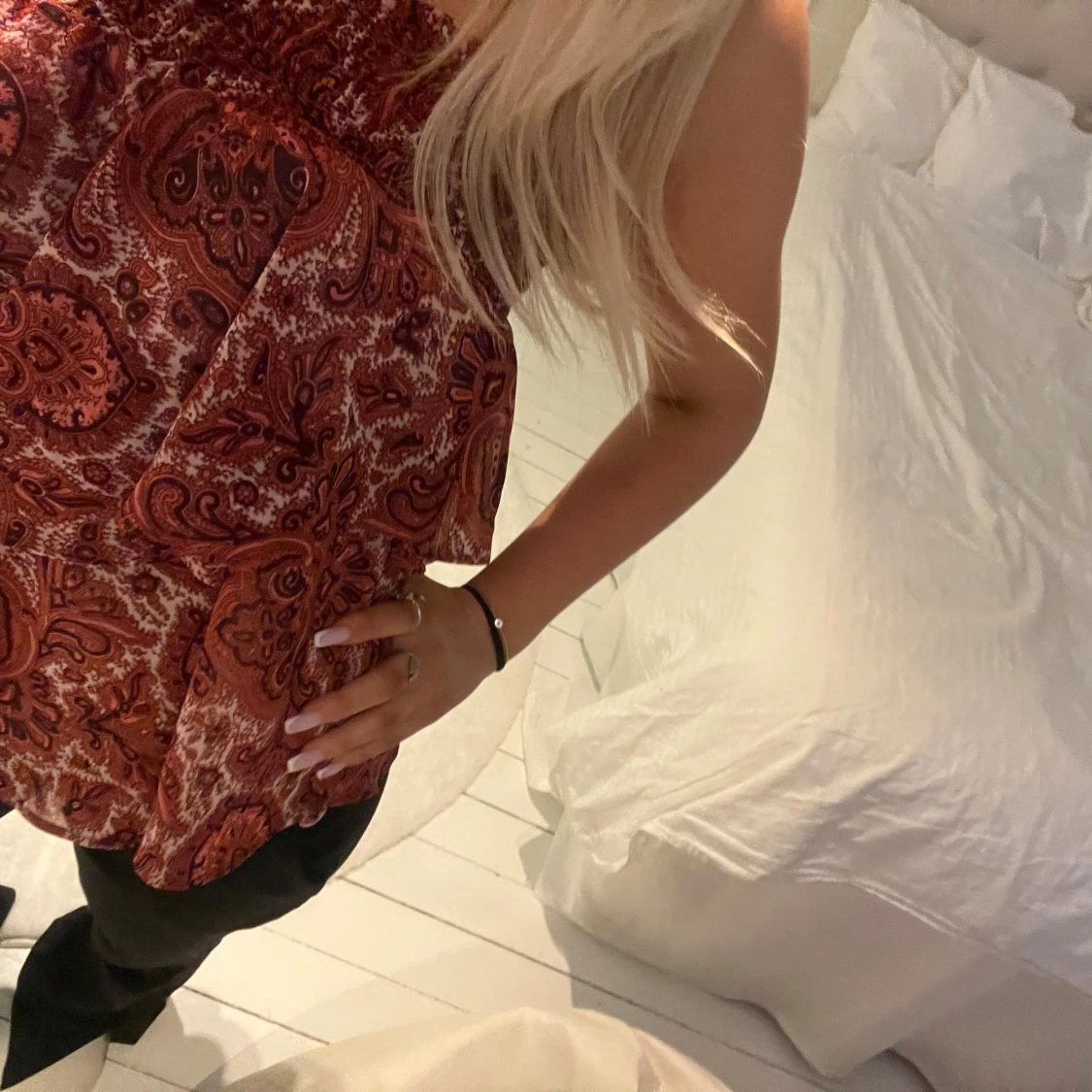 Mönstrad axelbandslös topp