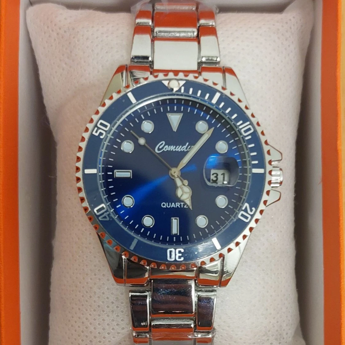 Blå klocka från Comuda