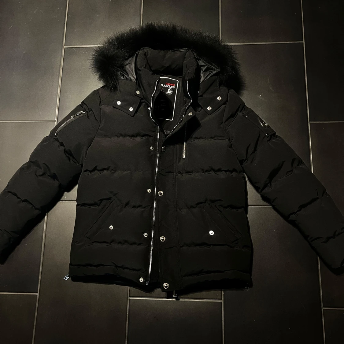 Svart dunjacka Moose Knuckles