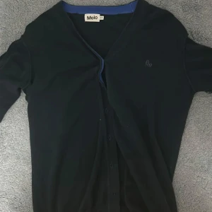 Cardigan size M - Blå cardigan från molo står 170 passar S/M