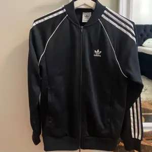 Adidas tröja med zip utan luva, storlek M Herr 