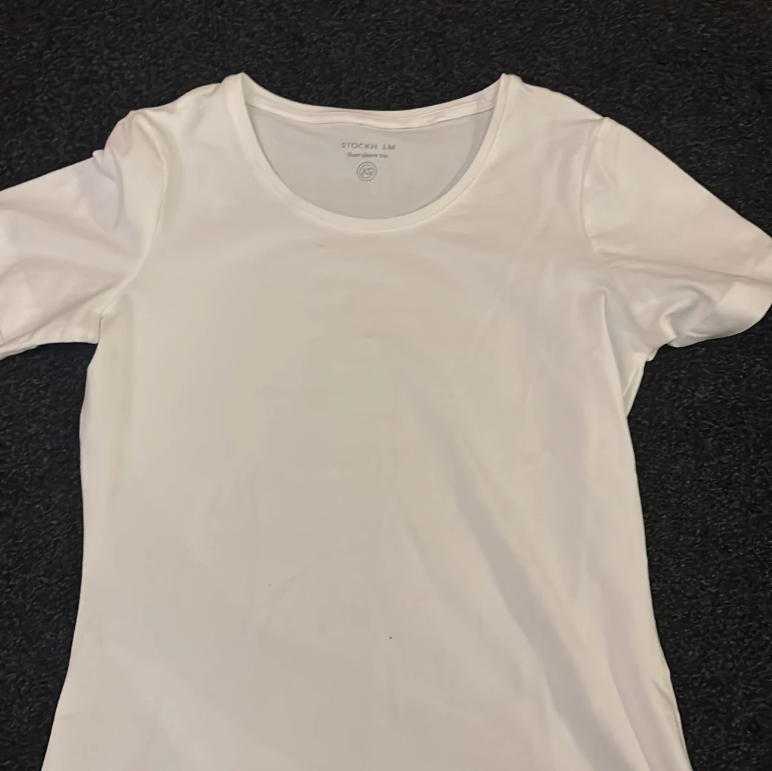 Vit t-shirt från Stockh LM - 90